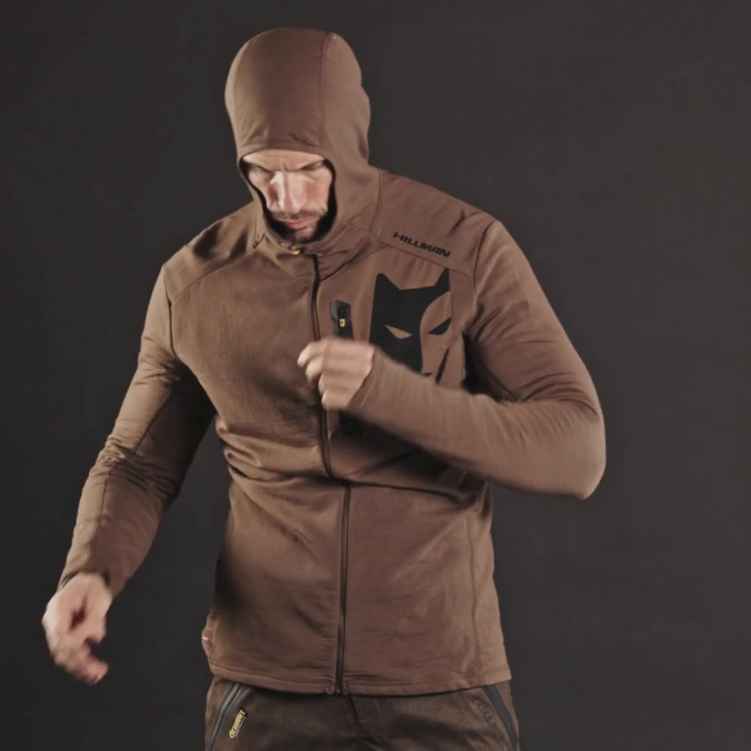 Video with a man wearing world's best merino wool hunting mid-layer - The warmest hoodie available in men's and women's sizes.